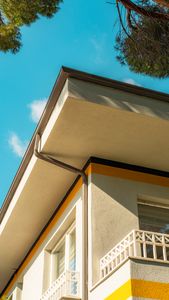 Modern house exterior featuring balconies and a vibrant facade in Istanbul, Turkey.